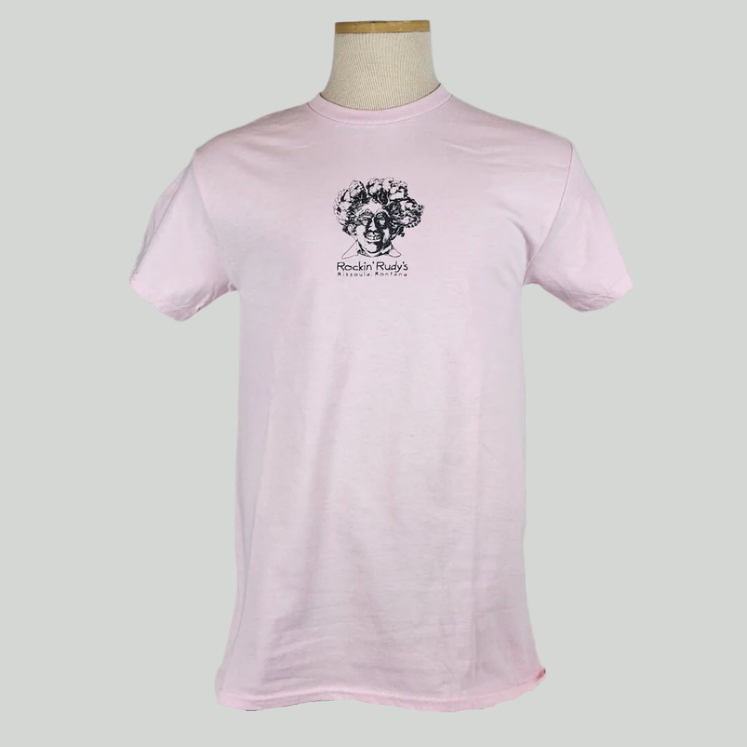 Pink shirt with smiling man’s head with trees for hair, "Rockin Rudy's, Missoula, Montana," printed below in center chest.