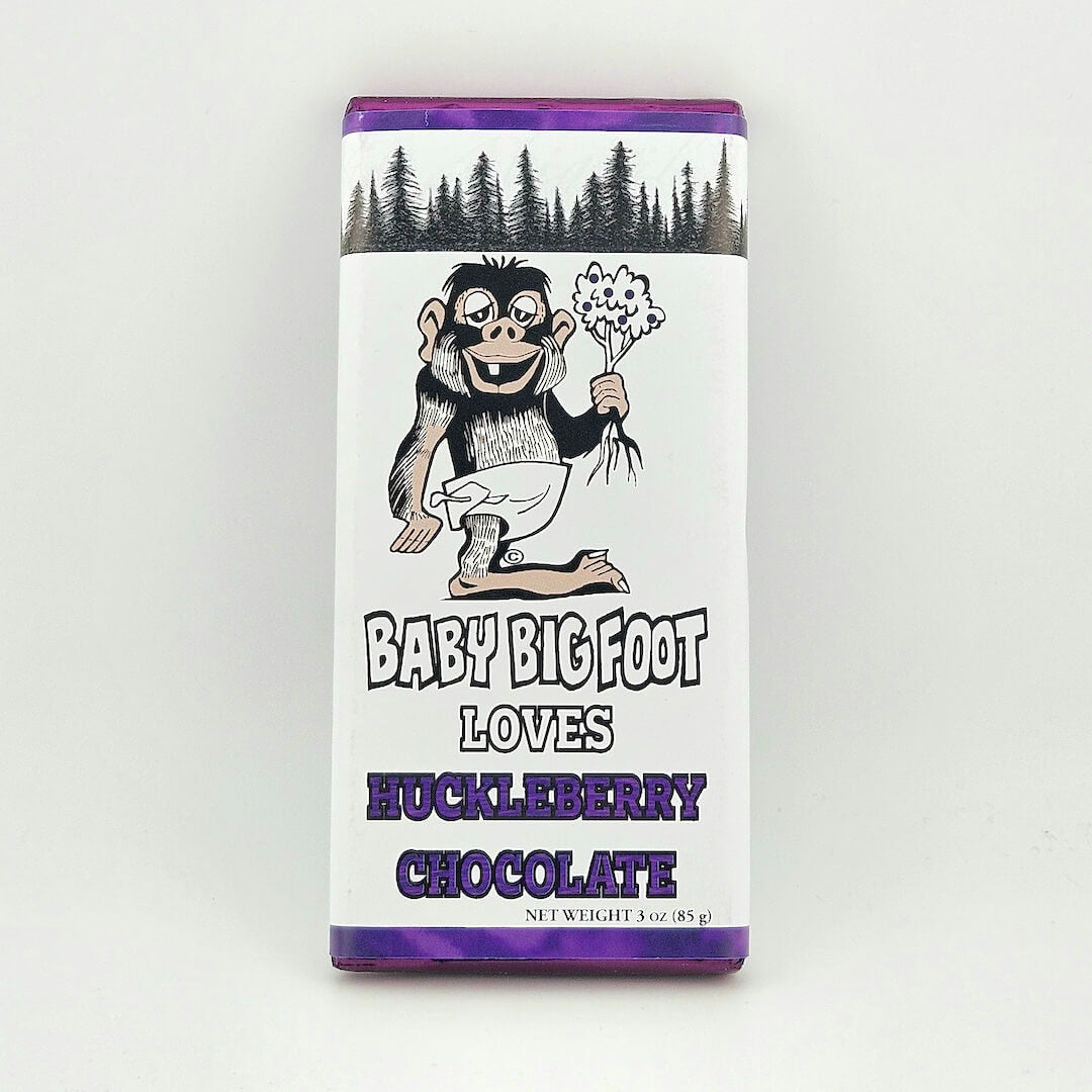 Chocolate bar packaging with a cartoon Bigfoot character on a white background