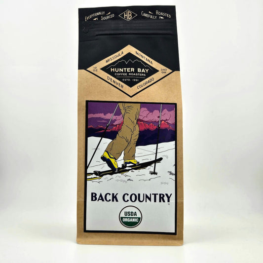 Coffee bag from Hunter Bay Coffee Roasters with a skier illustration on a white background