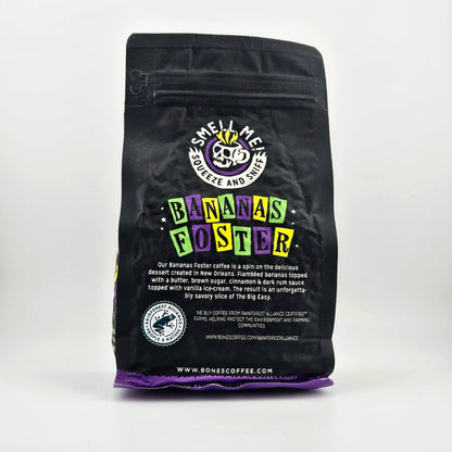 Black coffee bag labeled 'Bananas Foster' by Bones Coffee on a white background