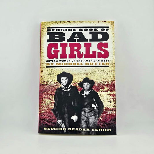 Book cover of 'Bedside Book of Bad Girls' with two women in cowboy hats on a textured background.