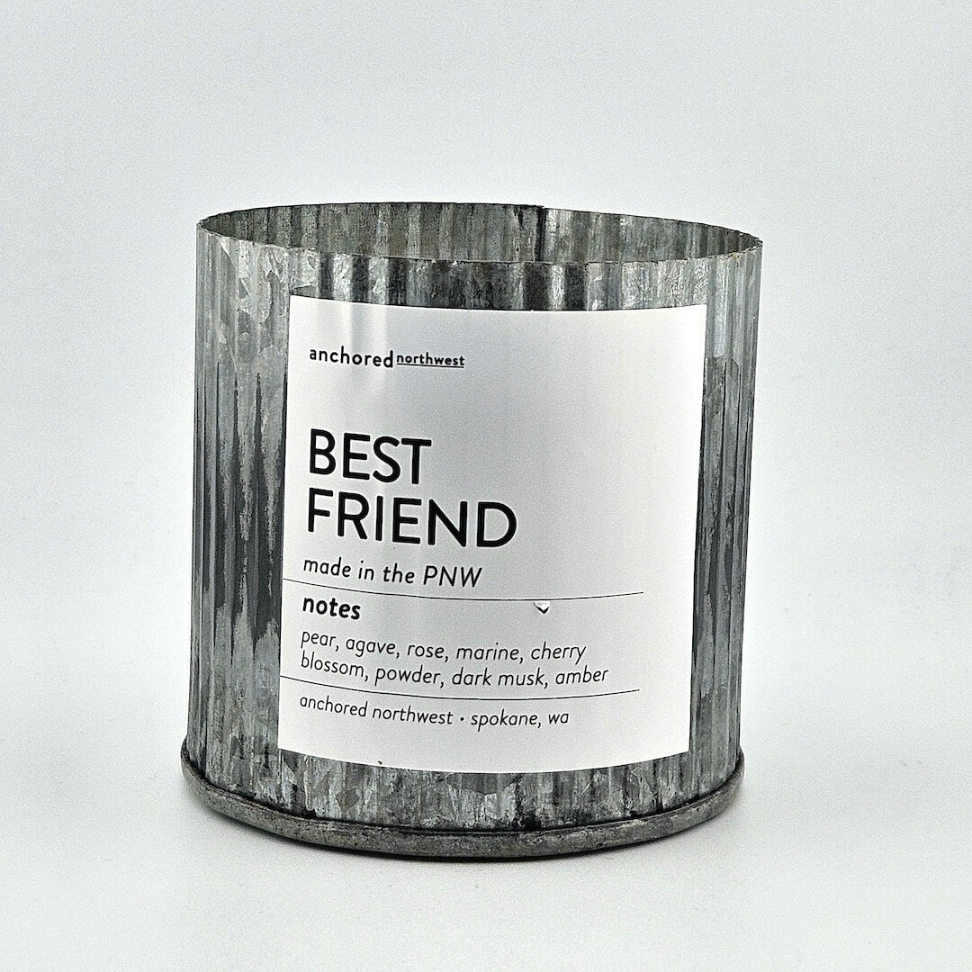 Candle with a label on a white background