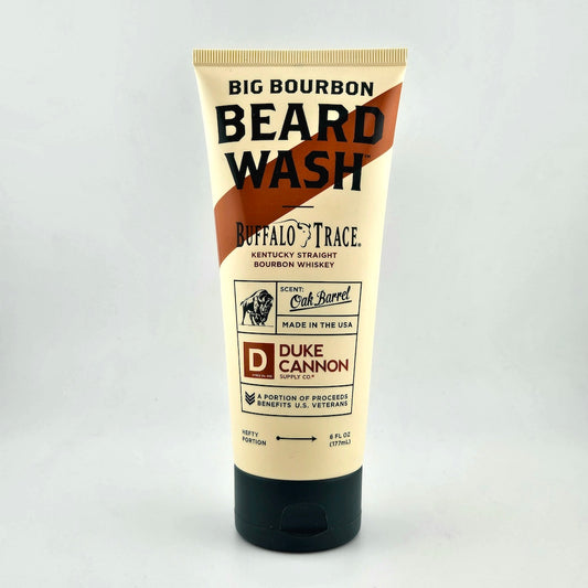 Tube of Big Bourbon Beard Wash by Duke Cannon on a gray background