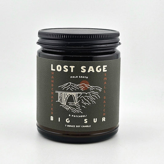 Candle jar labeled 'Lost Sage, Big Sur' on a white background