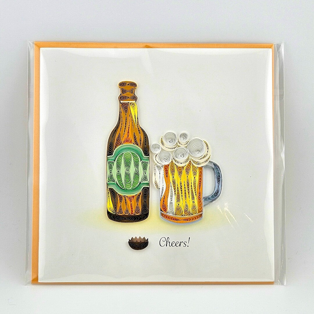 Quilled art of a beer bottle and mug with 'Cheers!' text on a white background
