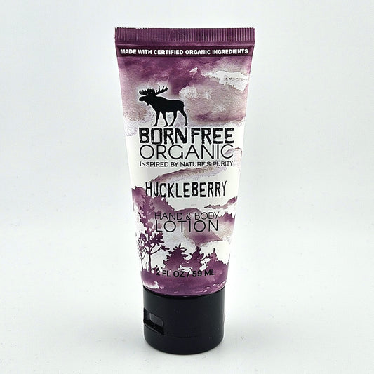 Tube of Born Free Organic Huckleberry hand and body lotion on a white background