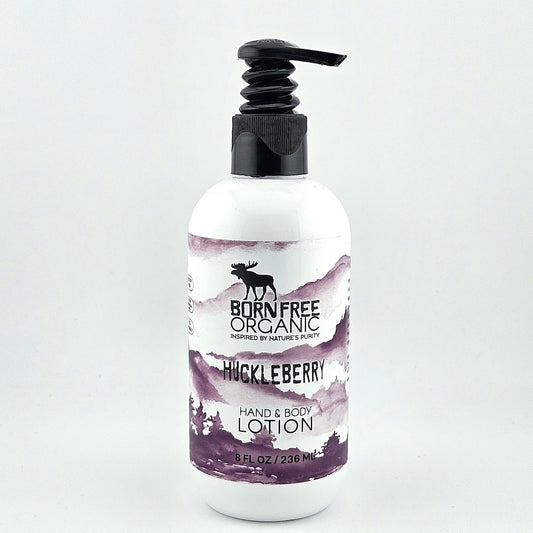 Born Free Organic Huckleberry hand and body lotion bottle on a white background