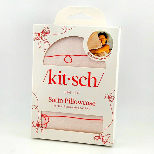 Pink box for satin pillowcase against white background. 