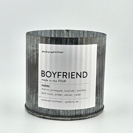 Candle with a label on a white background