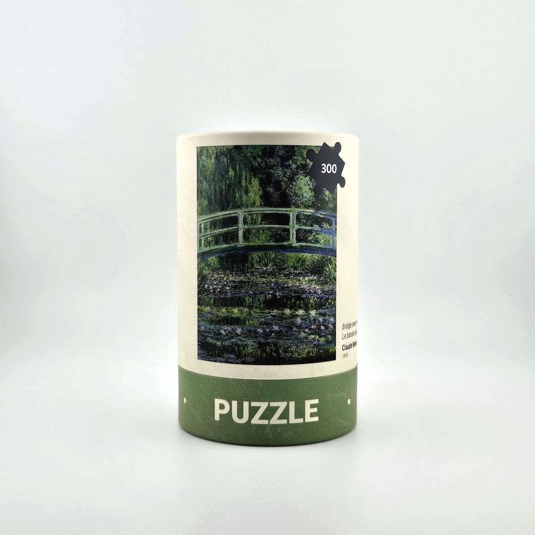 Jigsaw puzzle box with a scenic design on a white background