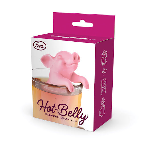 White and pink box for Fred Hot-Belly tea infuser with pig shaped infuser inside clear mug. 