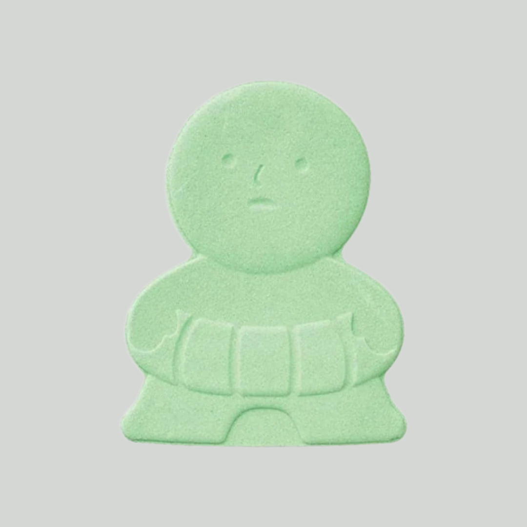 Sea foam green bath product shaped like human with inner-tube around waist. 
