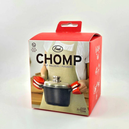 Red packaging for teeth shaped pot holders against white background.
