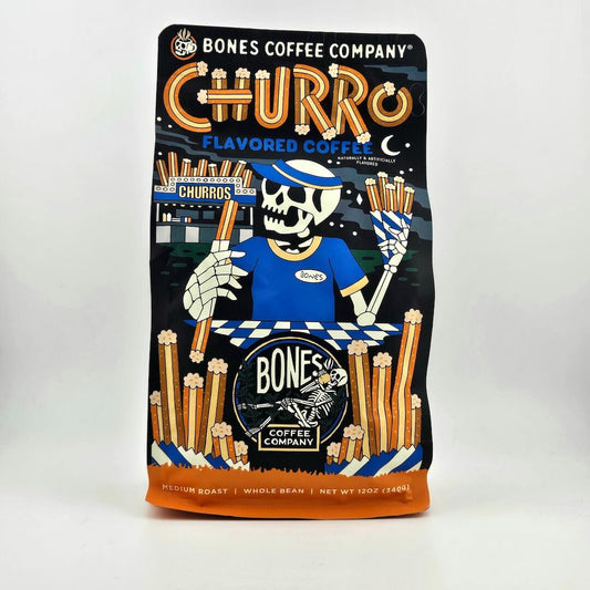 Black coffee bag with "Bones Coffee Company" branding and skeleton illustration. 