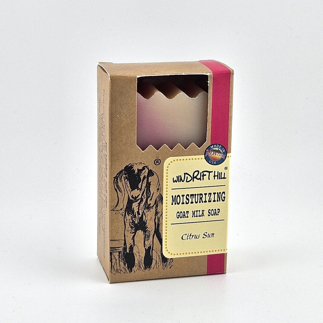 Box of Windrift Hill moisturizing goat milk soap on a gray background