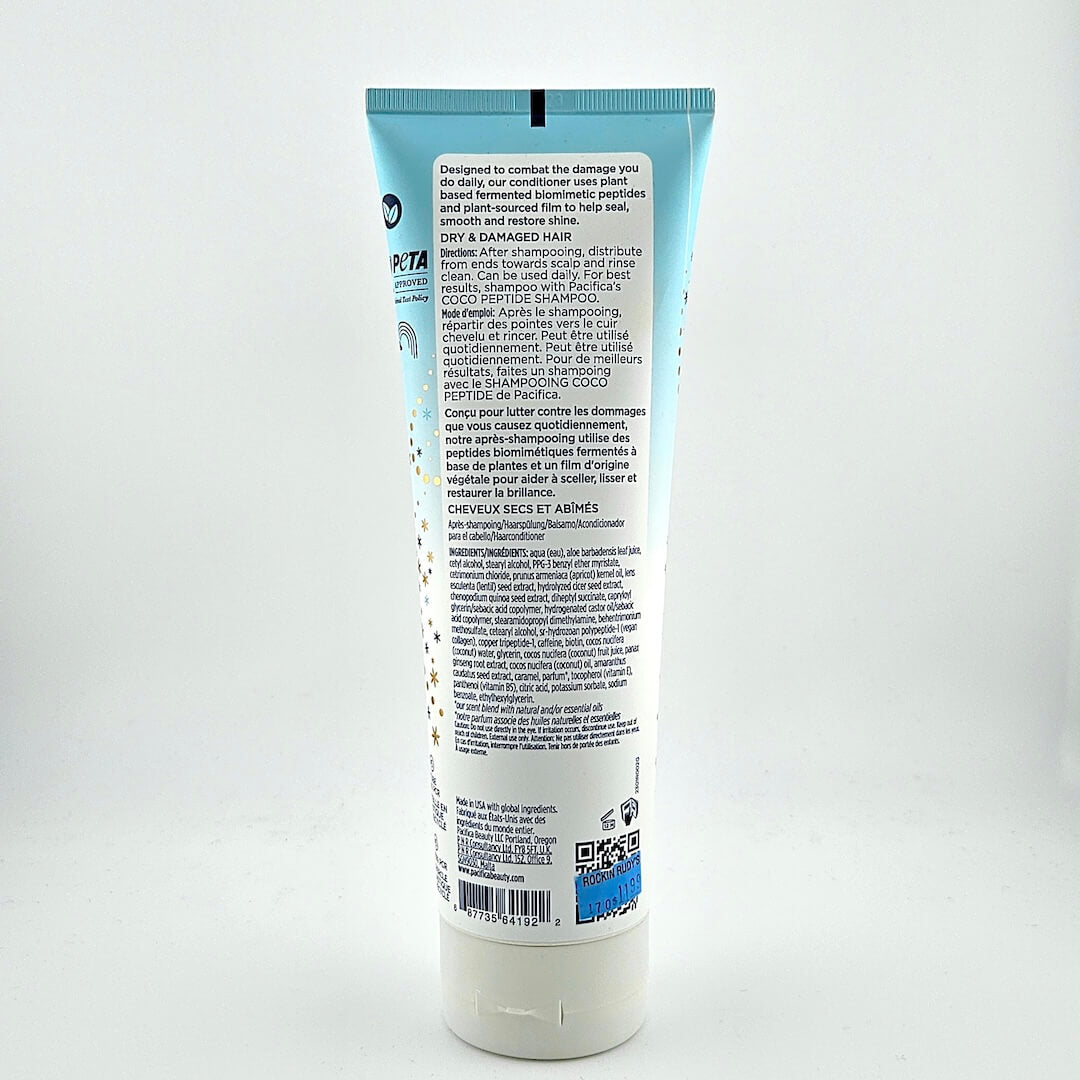 Back view of a haircare product tube with text on a white background