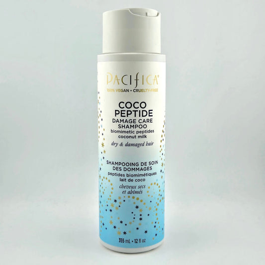 Shampoo bottle labeled 'Coco Peptide Damage Care Shampoo' by Pacifica on a light gray background