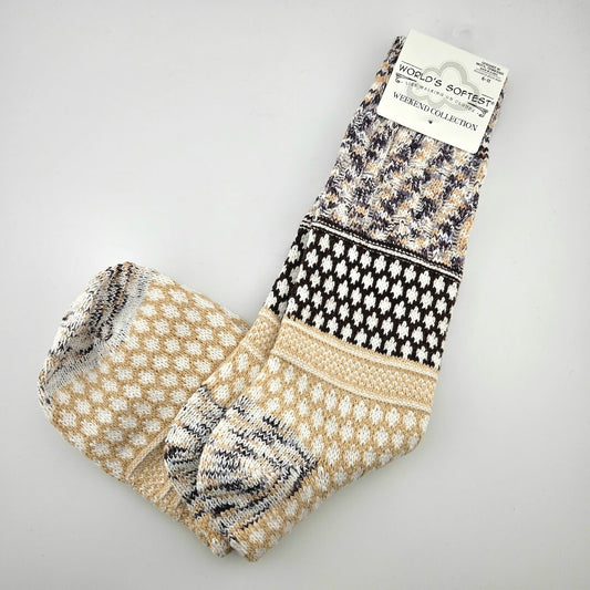 Pair of patterned socks on a gray background with a 'World's Softest' label.