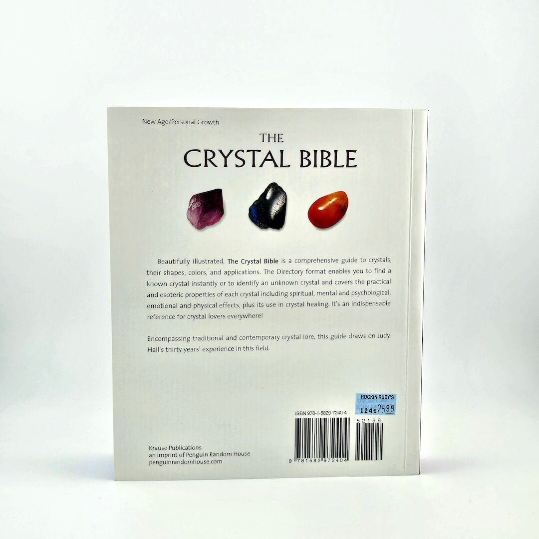 Back cover of 'The Crystal Bible' with crystal illustrations and text on a white background
