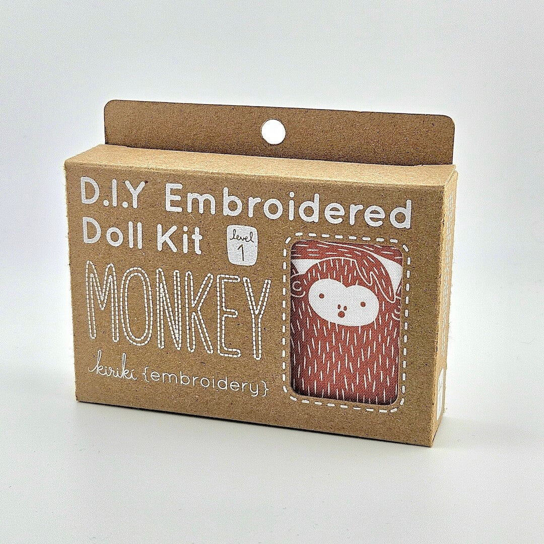 D.I.Y Embroidered Doll Kit packaging with monkey design on a white background