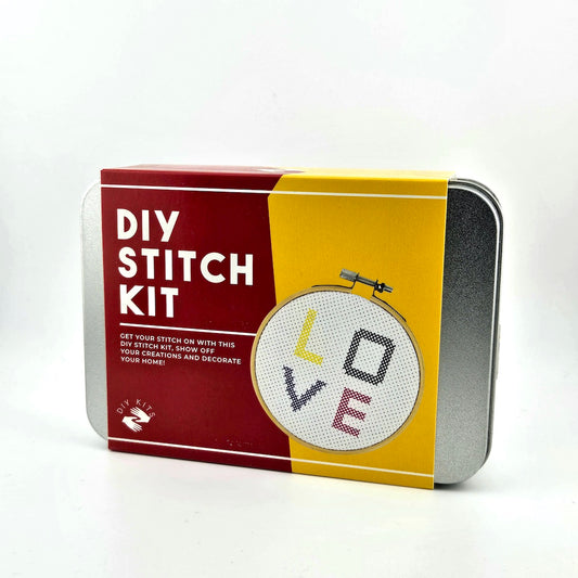 DIY Stitch Kit packaging with 'LOVE' cross-stitched design on a white background