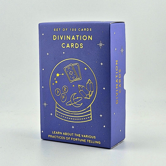 Blue box of divination cards with gold text and symbols on a light gray background