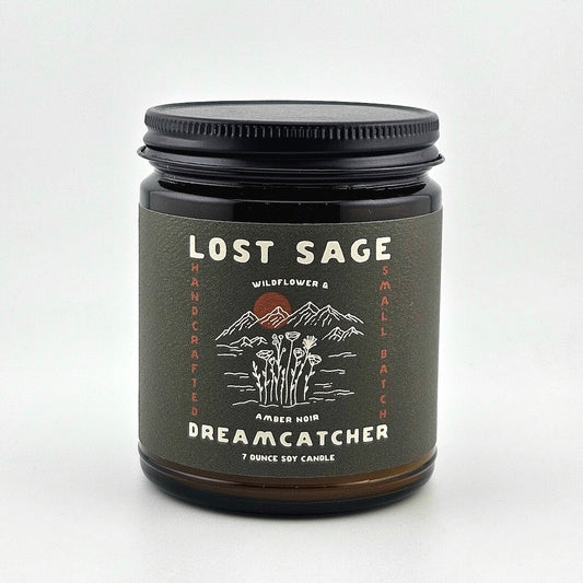 Candle jar with 'Lost Sage' label on a white background