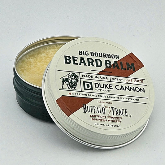 Beard balm container with Duke Cannon branding on a white background