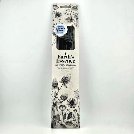 Earth's Essence hair product packaging with nature-themed design on a white background