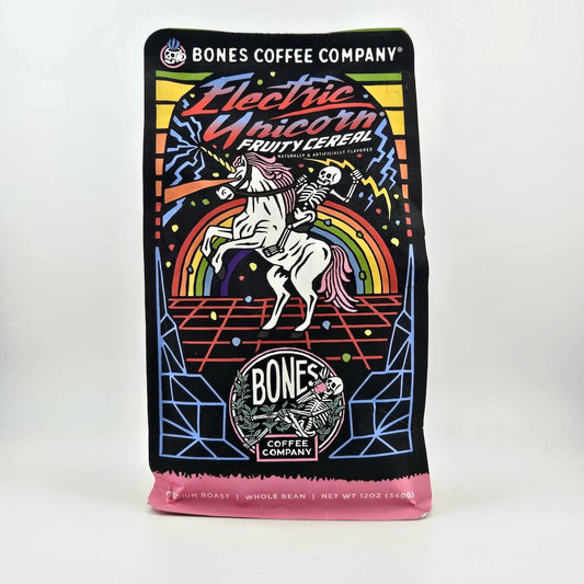 Coffee package from Bones Coffee Company with colorful design and unicorn illustration on a white background