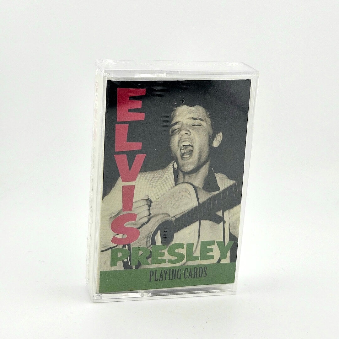 Elvis Presley playing cards packaging with a black and white photo of Elvis holding a guitar.