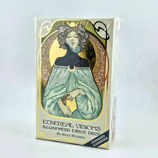 Ethereal Visions Illuminated Tarot Deck packaging with a woman's face and floral design on a white background