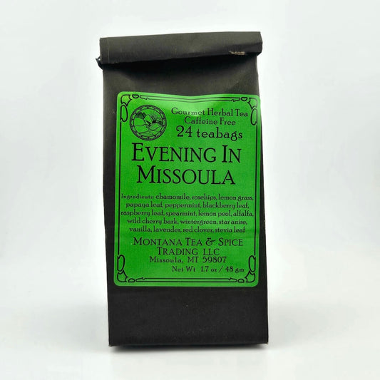 Black paper bag with rolled top with kelly-green label describing flavor and ingredients. 