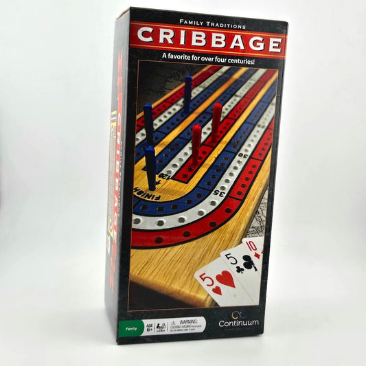 Cribbage board game box with playing cards on a white background
