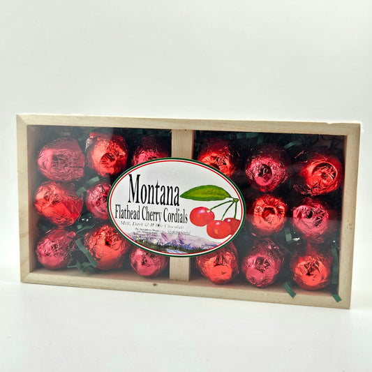 Box of Montana Flathead Cherry Cordials with a clear front panel showing red candies.