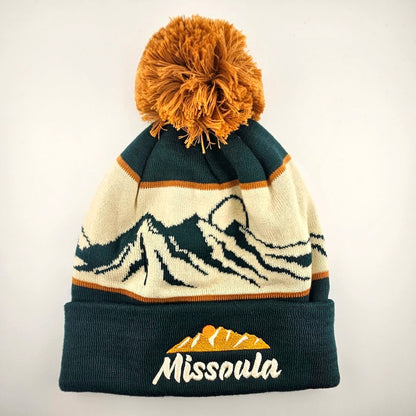 Knitted beanie with mountain design and 'Missoula' text on a white background