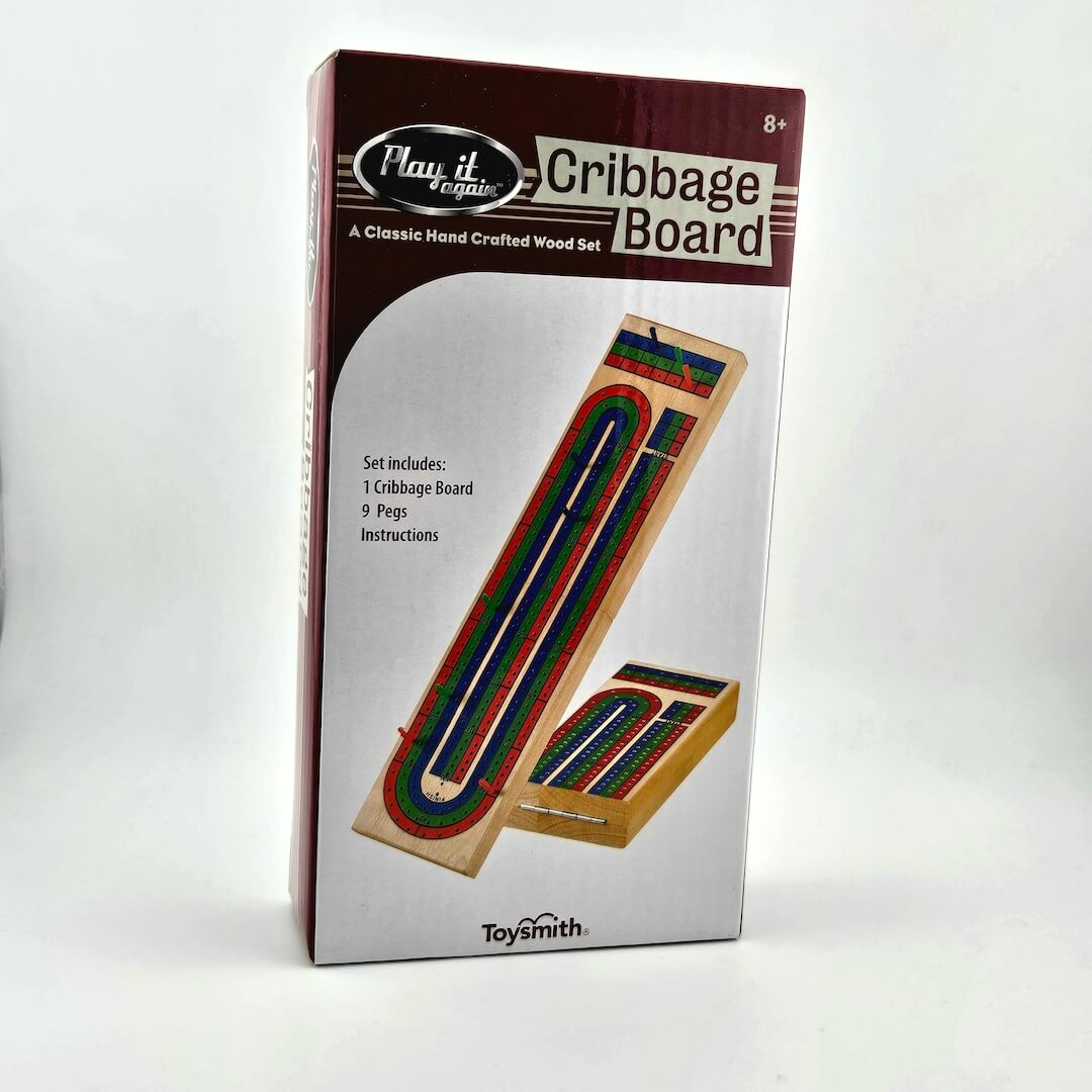 Boxed cribbage board set with 'Play it Again' branding on a white background