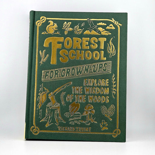 Book titled 'Forest School for Grown Ups' with gold text and illustrations on a green background