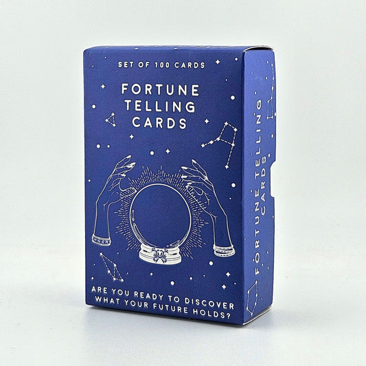 Blue box of fortune telling cards with white text and illustrations on a light gray background