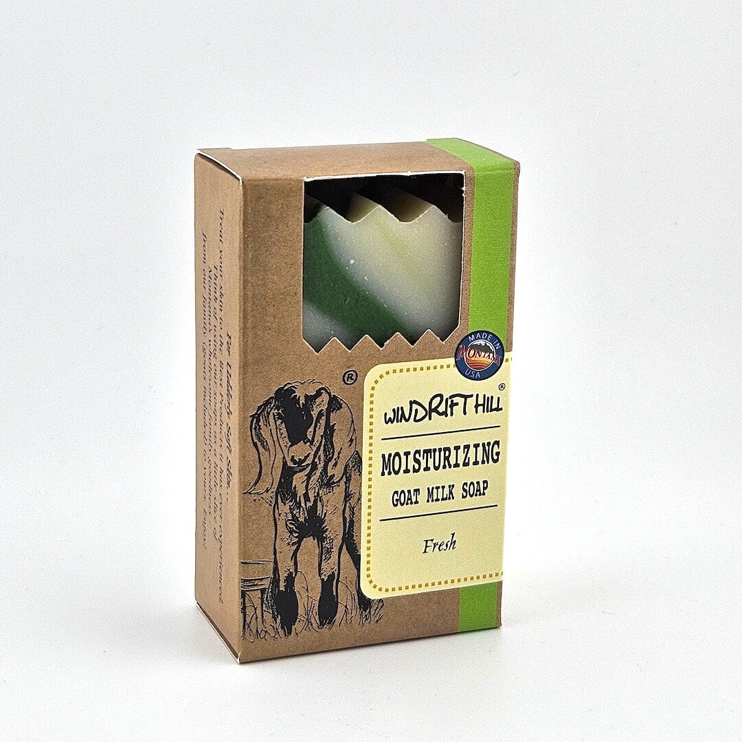 Box of Windrift Hill moisturizing goat milk soap on a gray background