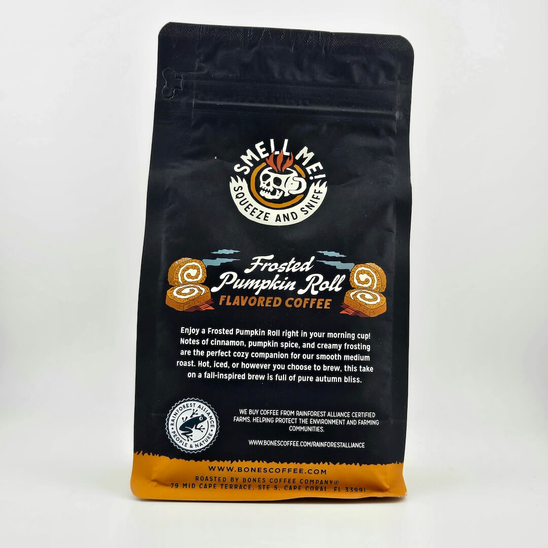 Black coffee bag with 'Frosted Pumpkin Roll' flavor description on a white background