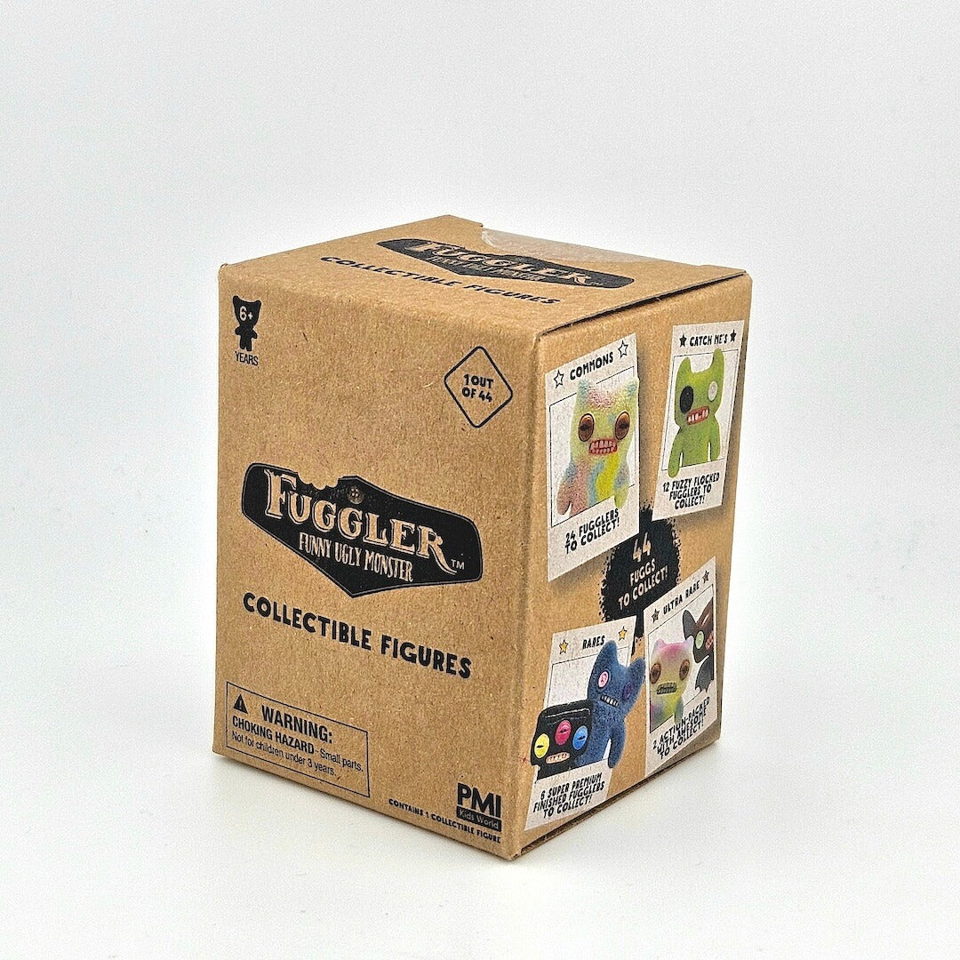 Brown box containing collectible figure against gray background. 