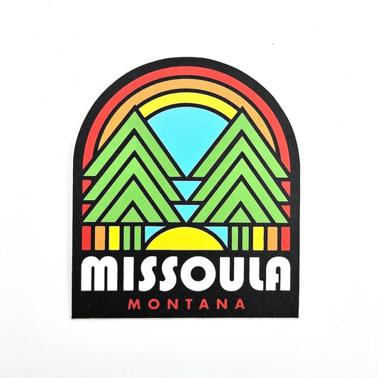 Sticker with a colorful mountain and rainbow design with 'Missoula Montana' text on a white background.