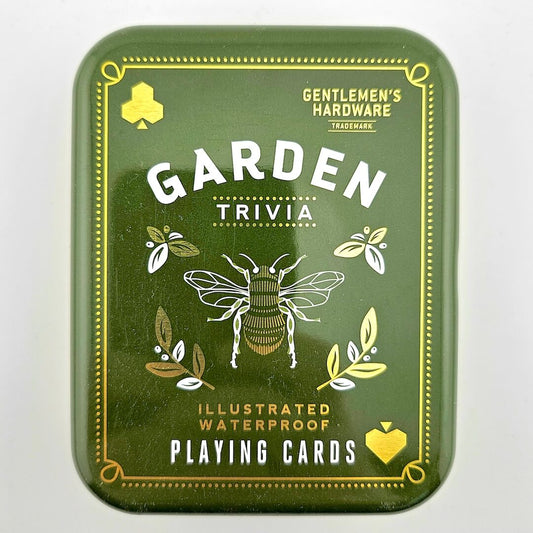 Green packaging of 'Garden Trivia' playing cards with a bee illustration on a white background
