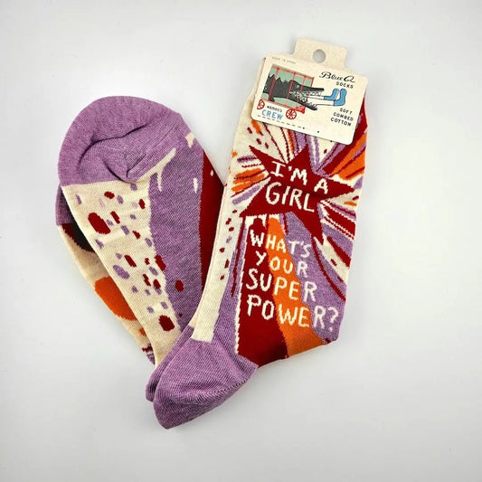 Colorful socks with text and patterns on a white background