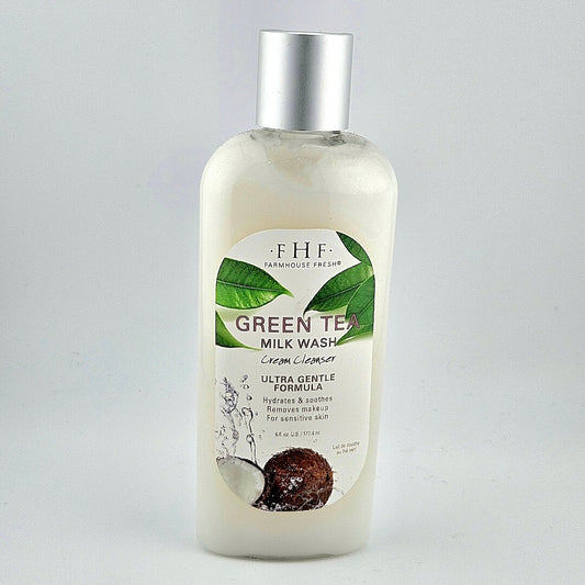 Bottle of Green Tea Milk Wash with a silver cap on a light gray background