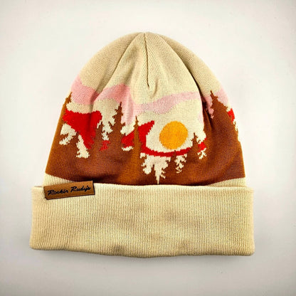 Knitted beanie with a colorful design on a light gray background