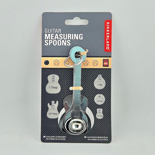 Guitar-shaped silver measuring spoons with packaging against white background.