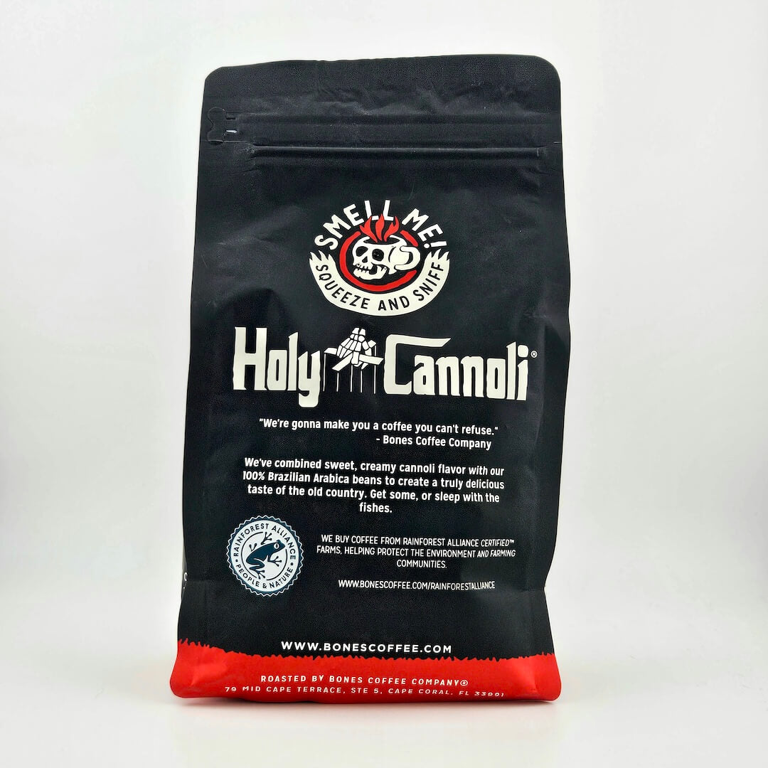 Black bag of coffee with "Holy Cannoli" theming