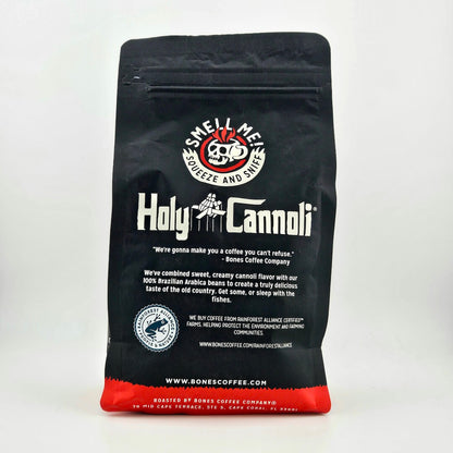 Black bag of coffee with "Holy Cannoli" theming